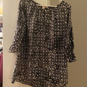 Black and white patterned blouse